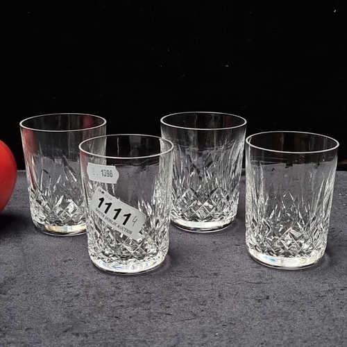 1111 - Set of four Waterford crystal whiskey glasses with intricate diamond-cut pattern, approximately 4 in... 