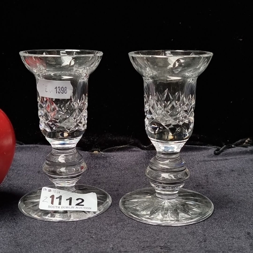 1112 - Pair of Waterford Crystal candle holders featuring intricate cut patterns. Height approximately 10 c... 