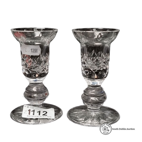 1112 - Pair of Waterford Crystal candle holders featuring intricate cut patterns. Height approximately 10 c... 