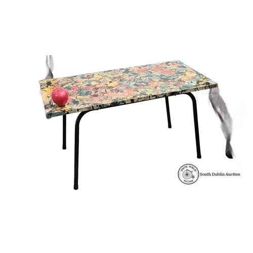 1179 - Retro coffee table with black metal legs and a vibrant comic-themed laminated top. Approximately 24 ... 