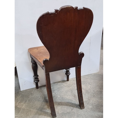 1180 - Victorian mahogany chair featuring carved scroll back and turned legs. Approximately 85cm high, 45cm... 