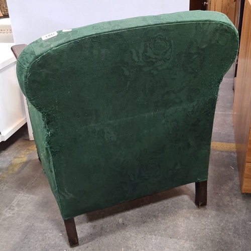 1181 - Vintage armchair with green floral upholstery and wooden armrests. Approximately 90 cm high, 75 cm w... 