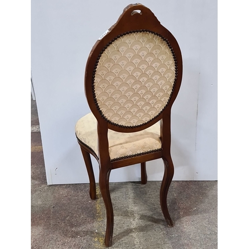 1185 - Carved wood frame Victorian-style upholstered chair with an elegant floral pattern. Approximately 40... 