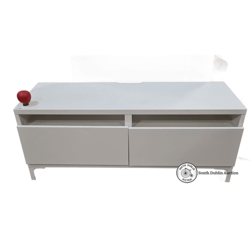 1186 - A low White modern low media unit with two open shelves and two drawers. Approximately 120 cm wide, ... 