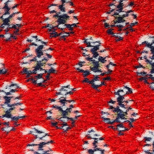 1257 - Super Star Lot: A fabulous, very large, quality hand knotted rug in a geometric pattern predominantl... 