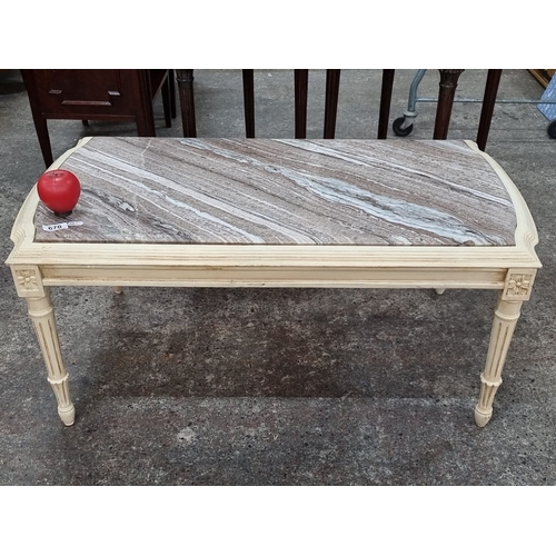 1260 - Star lot : A cold Italian Marble-topped wooden coffee table with carved legs and decorative floral a... 