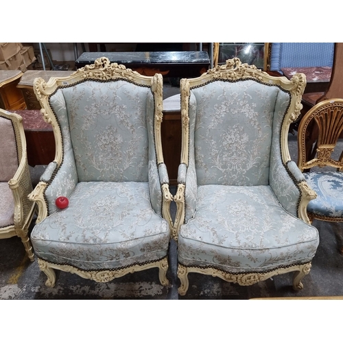 1265 - Super Star Lot : Pair of fine  Louis XV-style armchairs with ornate carved frames and pale blue flor... 