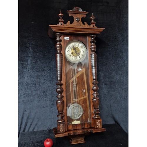 1028 - Star Lot: A wonderful 19th century Vienna Wall Clock with Pendulum and Key. Written 'Made in Rathfar... 