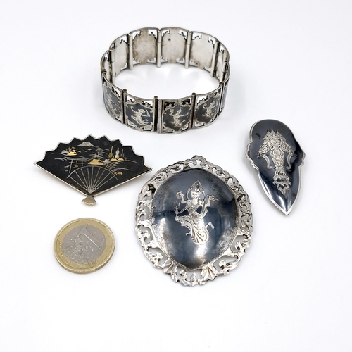 1276 - A collection of four Siam sterling silver items. Total weight - 69.8 grams. Items as per photographe... 