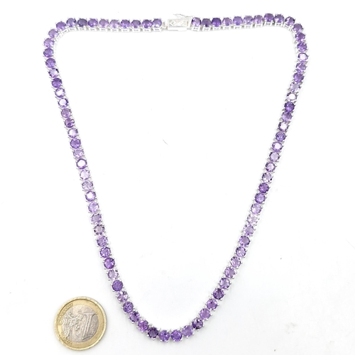 1278 - Star lot : A nice example of an amethyst stone necklace set in sterling silver. length of necklace -... 