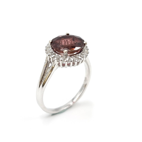 1282 - Star Lot : A pretty tourmaline gemstone ring with diamond mount set in sterling silver. Ring size - ... 