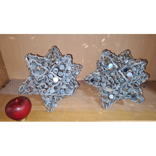 1289 - A pair of decorative star-shaped sculptures crafted from wire and reflective discs.
Previous in auct... 