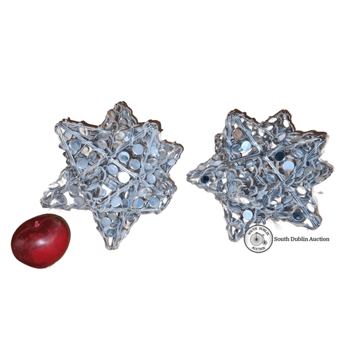 1289 - A pair of decorative star-shaped sculptures crafted from wire and reflective discs.
Previous in auct... 