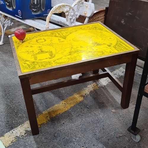 1292 - A wooden table with vintage world map design on yellow laminated top. Approximately 18 inches high, ... 