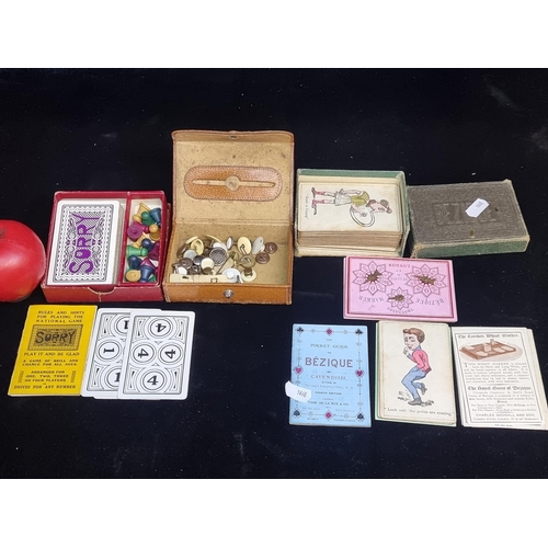 1313 - Three vintage items including a pocket version of Bézique (a trick-taking card game for two), a mini... 