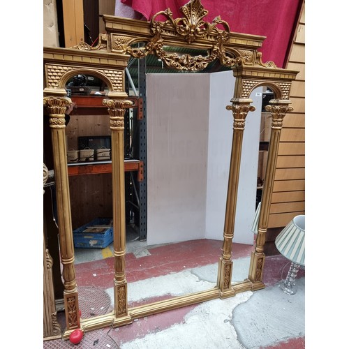 1337 - Star lot : A stunning very large gilt gold Parclose mirror featuring four tall fluted columns and th... 