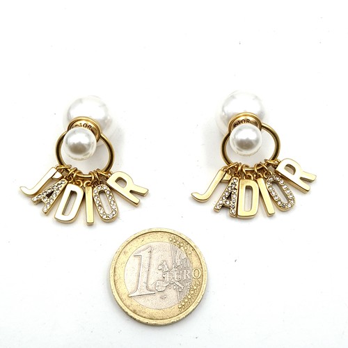 49 - A stunning designer pair of original Christian Dior pearl earrings with 