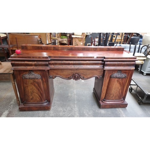 1191 - Star Lot : A fabulous large 19th-century Victorian mahogany sideboard with intricate carved details,... 