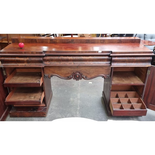 1191 - Star Lot : A fabulous large 19th-century Victorian mahogany sideboard with intricate carved details,... 