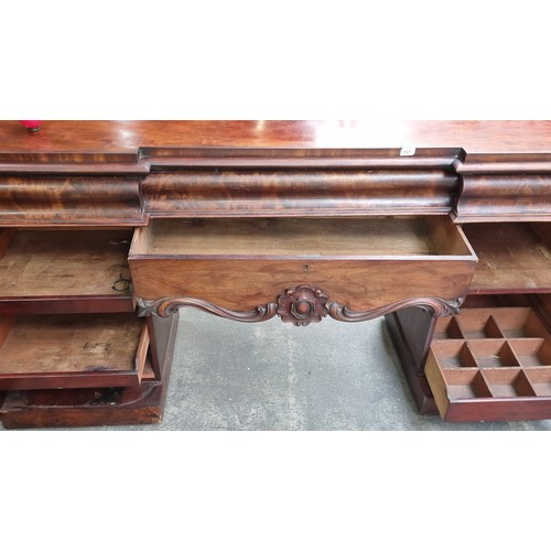 1191 - Star Lot : A fabulous large 19th-century Victorian mahogany sideboard with intricate carved details,... 