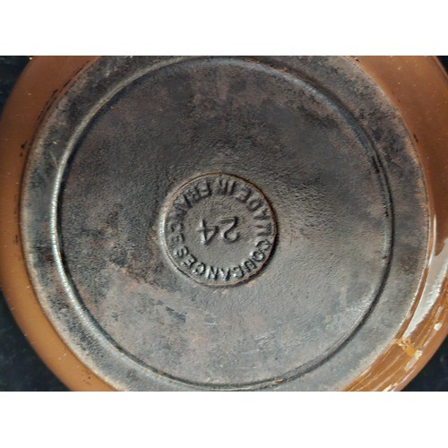 225 - A very heavy cast iron French made Cousances lidded casserole dish.