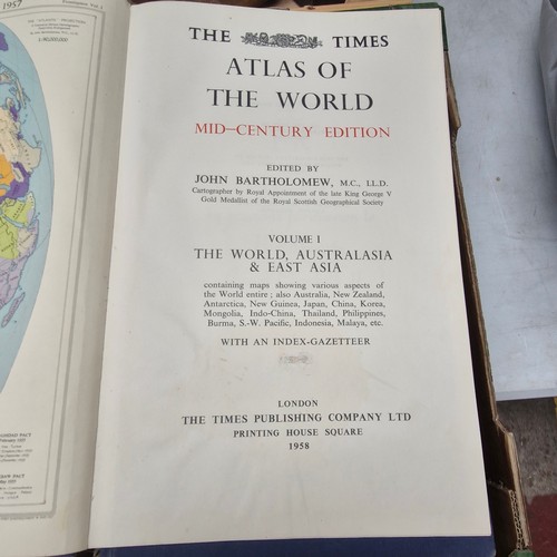 338 - Five large hardback volumes of the Times Atlas of the World dating to 1958. Selling on barterbooks.c... 