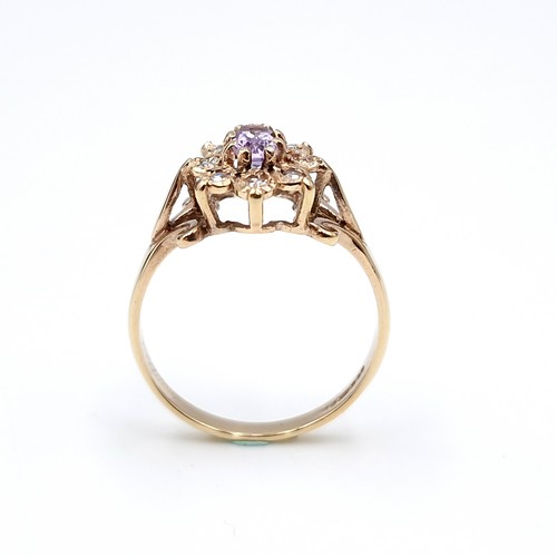 3 - Star Lot : A very elegant nine carat gold diamond and amethyst stone ring with star design. Ring siz... 