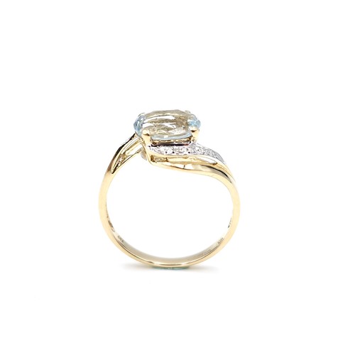 8 - Star Lot : A beautiful example of a large aquamarine gemstone ring set in nine carat gold with diamo... 