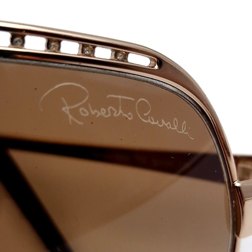 13 - A pair of gold framed designer  Roberto Cavalli sunglasses with serial no. to frame. Lenses in good,... 