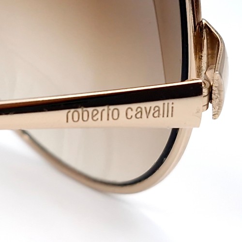 13 - A pair of gold framed designer  Roberto Cavalli sunglasses with serial no. to frame. Lenses in good,... 