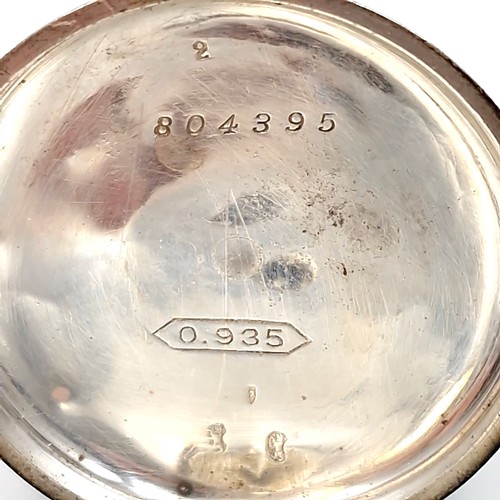 18 - A Britannia 935 silver cased pocket watch no. 804395. Maker - J.G. Graves Sheffield - Swiss made. Se... 