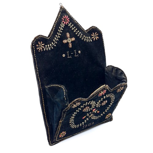 35 - An interesting antique letter mounted holder with suspension ring. Item nicely embroidered - dated 1... 