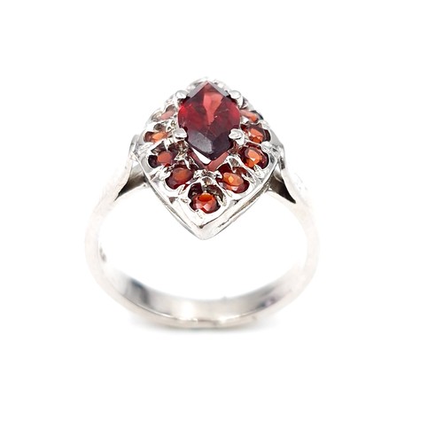 55 - A very pretty ruby gemset ring mounted in sterling silver. Ring size - S. Weight - 5.1 grams. Boxed.... 