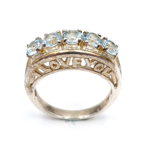 408 - A sterling silver ring with aquamarine stone setting. Size - O. Weight - 4.65 grams. With the words ... 