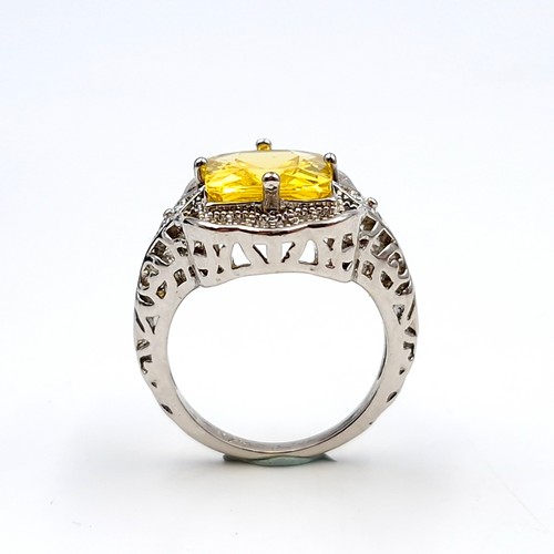 491 - A large citrine stone ring set in sterling silver with claw mount. Ring size - P. Weight - 4.98 gram... 