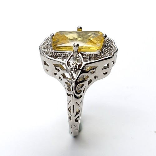 491 - A large citrine stone ring set in sterling silver with claw mount. Ring size - P. Weight - 4.98 gram... 