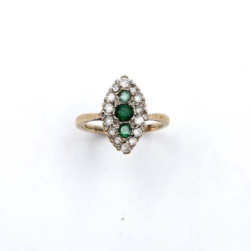 1117 - A nine carat gold (375) and Emerald gem set ring. Ring size - K 1/2. Weight - 1.75 grams. Boxed.