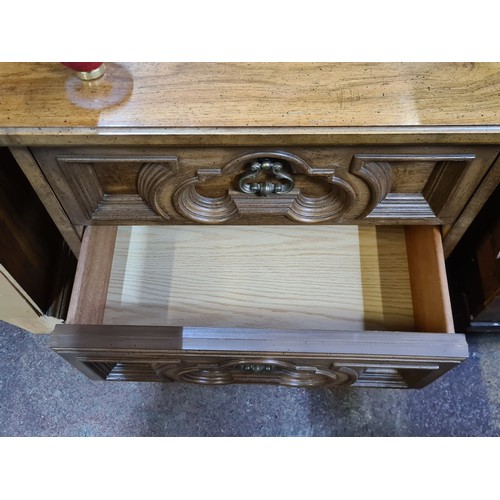 725 - Star lot : A fabulous four piece  Carved bedroom set Tall boy, Long Dresser and two matching lockers... 