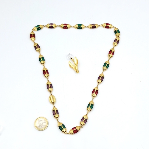 30 - Two Swarovski items including a gem stone necklace - Length 60cm / weight 78g. Together with a leaf ... 