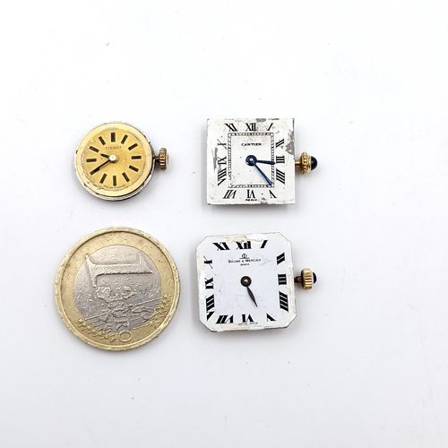 33 - Star Lot : A collection of three genuine watch movements, a vintage Cartier with a Sapphire cabochon... 