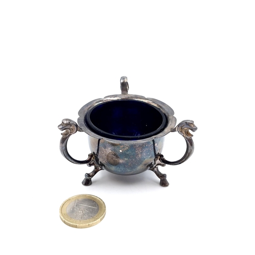 46 - An attractive cauldron style sterling silver salt cruet, together with three scroll handled mounts s... 