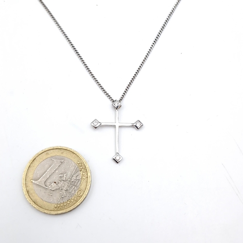 5 - A pretty pendant cross set with diamond points with sterling silver chain. Length of chain - 40cm. T... 