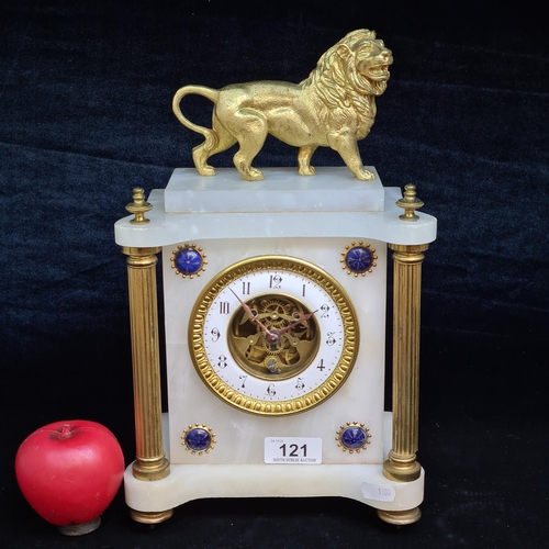 121 - Star lot : A beautiful French alabaster and gilt metal mantle clock surmounted by a lion with white ... 