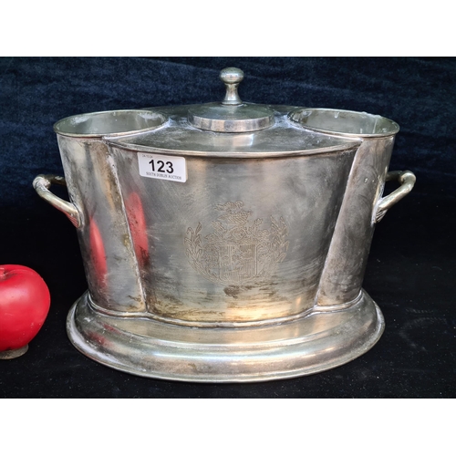 123 - A large and impressive vintage silver plated champagne cooler. Very cool piece.