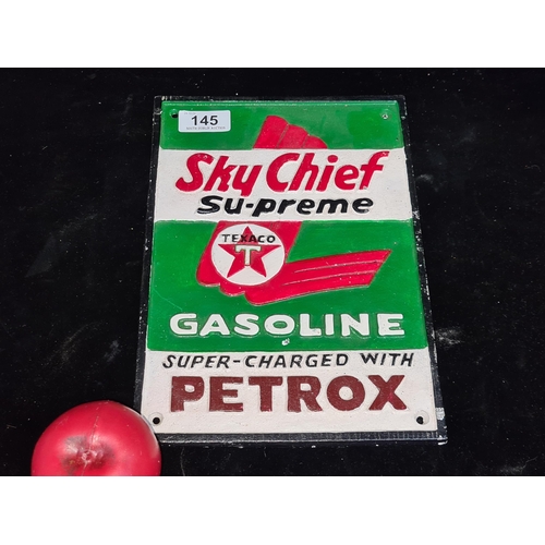 145 - A heavy cast metal wall plaque advertising Sky Chief Su-preme Texaco Gasoline.