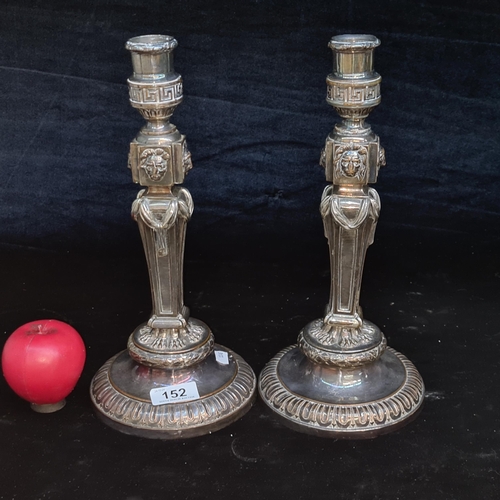 152 - An elegant pair of Georgian silver plate tall candlesticks. These might have adorned an Adams firepl... 