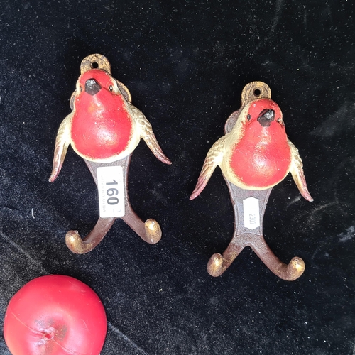 160 - A pair of cast metal door hooks in the forms of robin red breast birds.