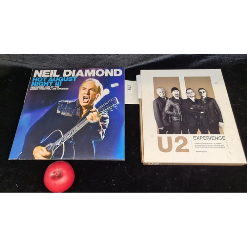 174 - A Neil Diamond twin vinyl record album (£39.99 via HMV), along with Brian Boyd's U2 Experience box s... 