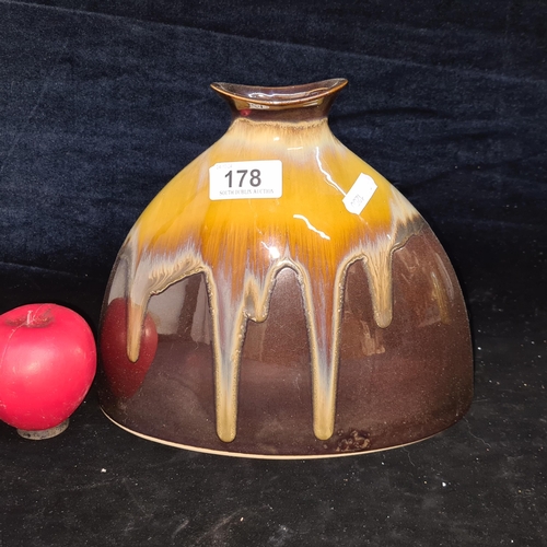 178 - An attractive mid century modern rich earthy brown wide vase featuring an unusual drip glaze in a sl... 