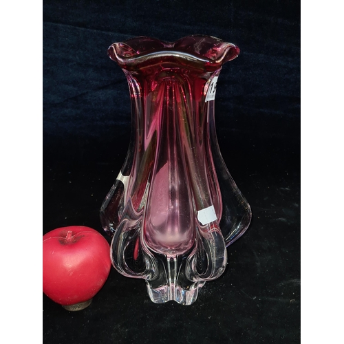 196 - A heavy beautiful Murano hand blow studio art cranberry glass vase. In very good condition.